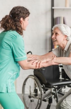 young-nurse-assisting-disabled-senior-woman 2 Personal Care